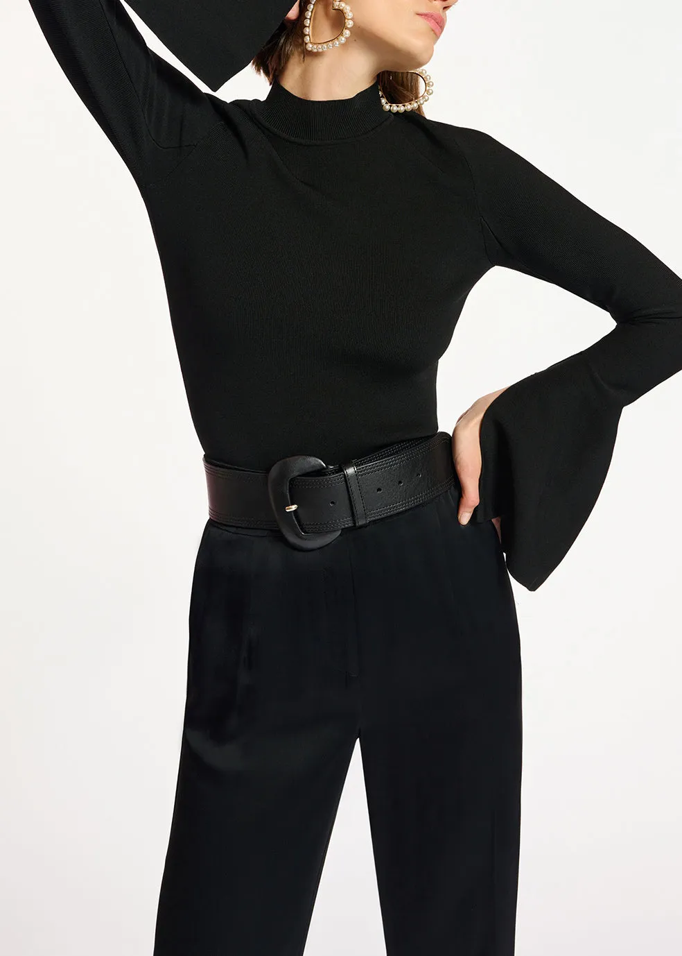 Black slim-fit knit sweater with trumpet sleeves