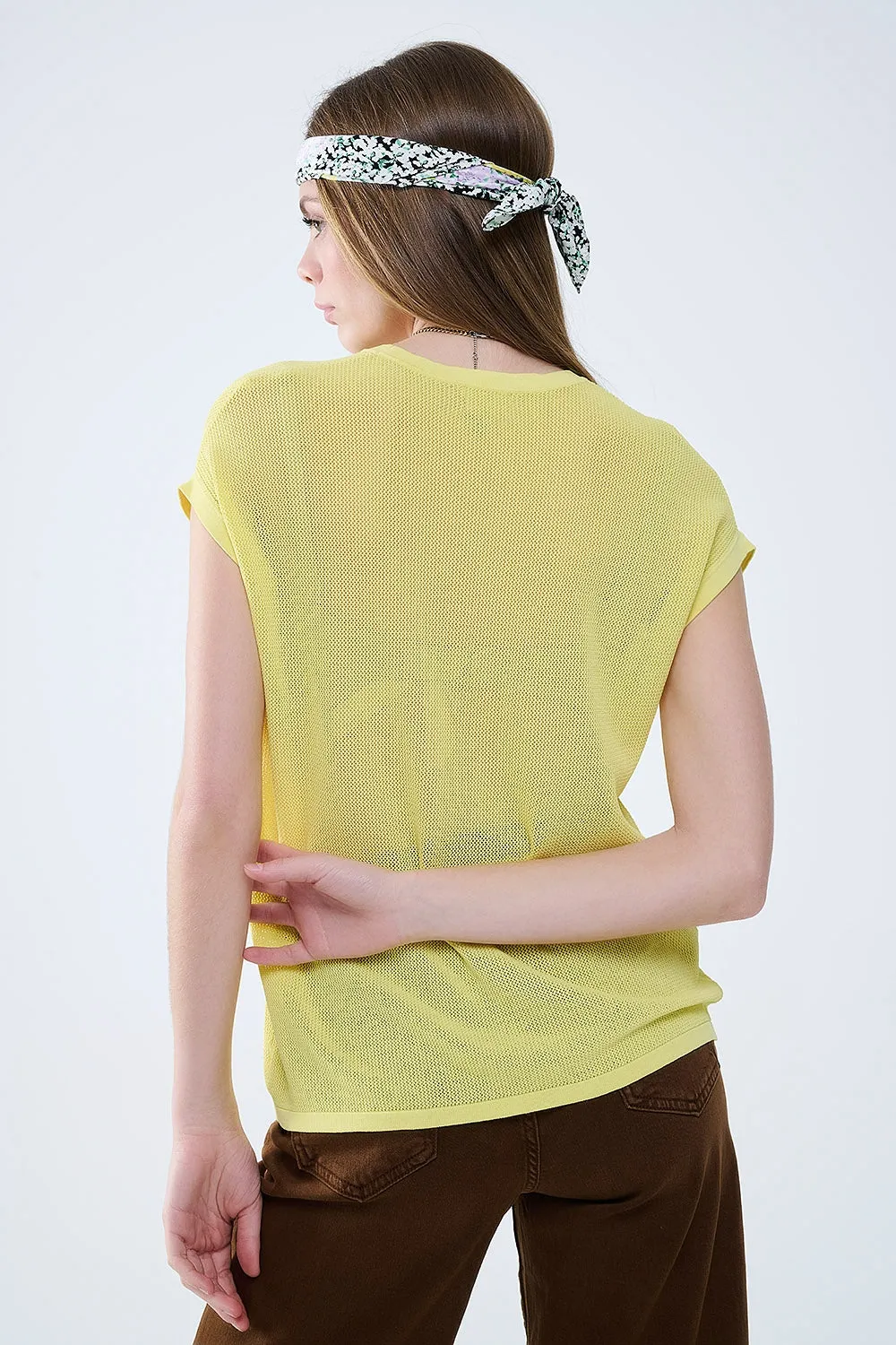 grid knit sweater in yellow color