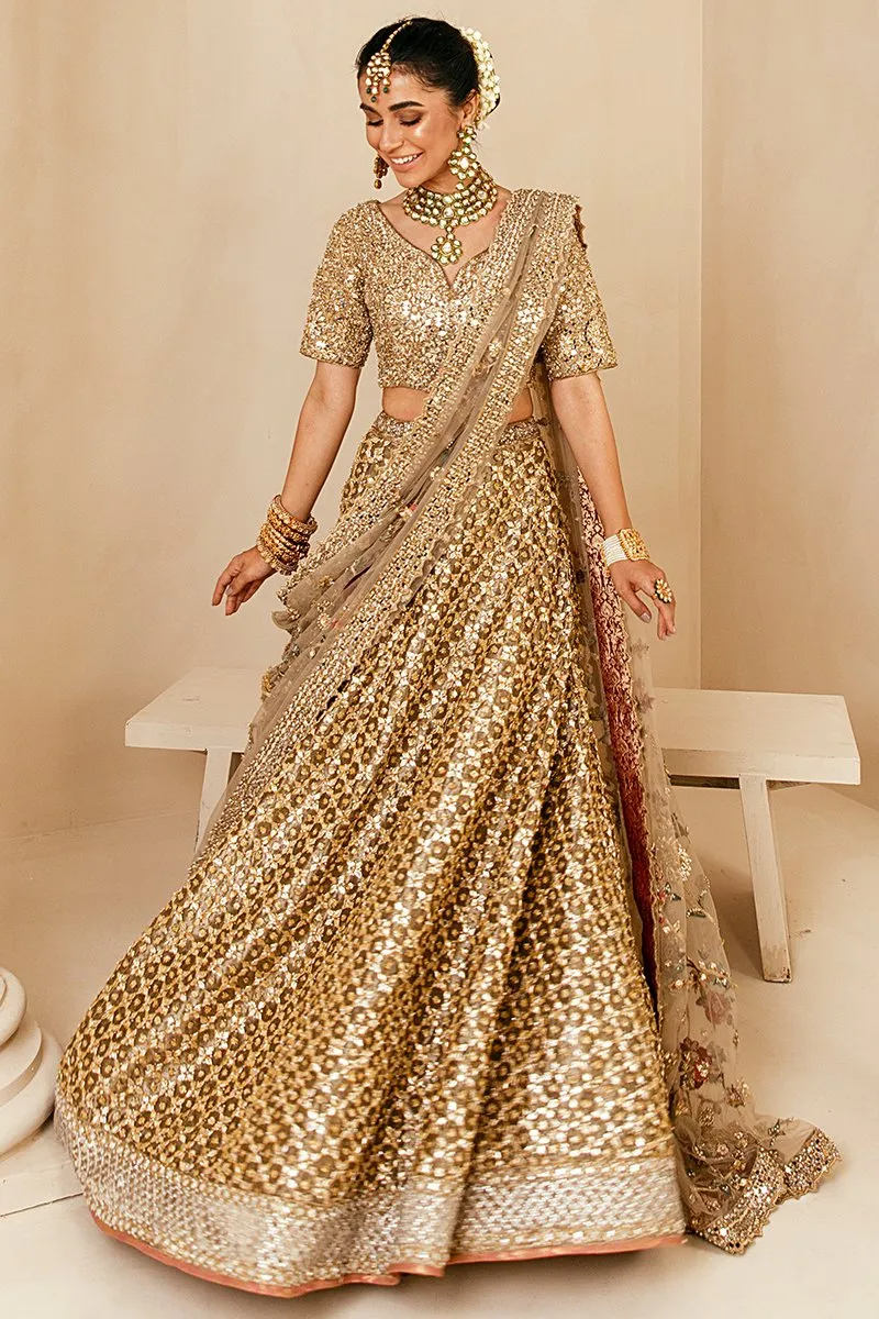 Popular Pakistani Bridal Lehenga in Embellished Heavy Sitara Work on Bridal Gold Lehenga Choli for Pakistani Brides in Raw Silk #BN933